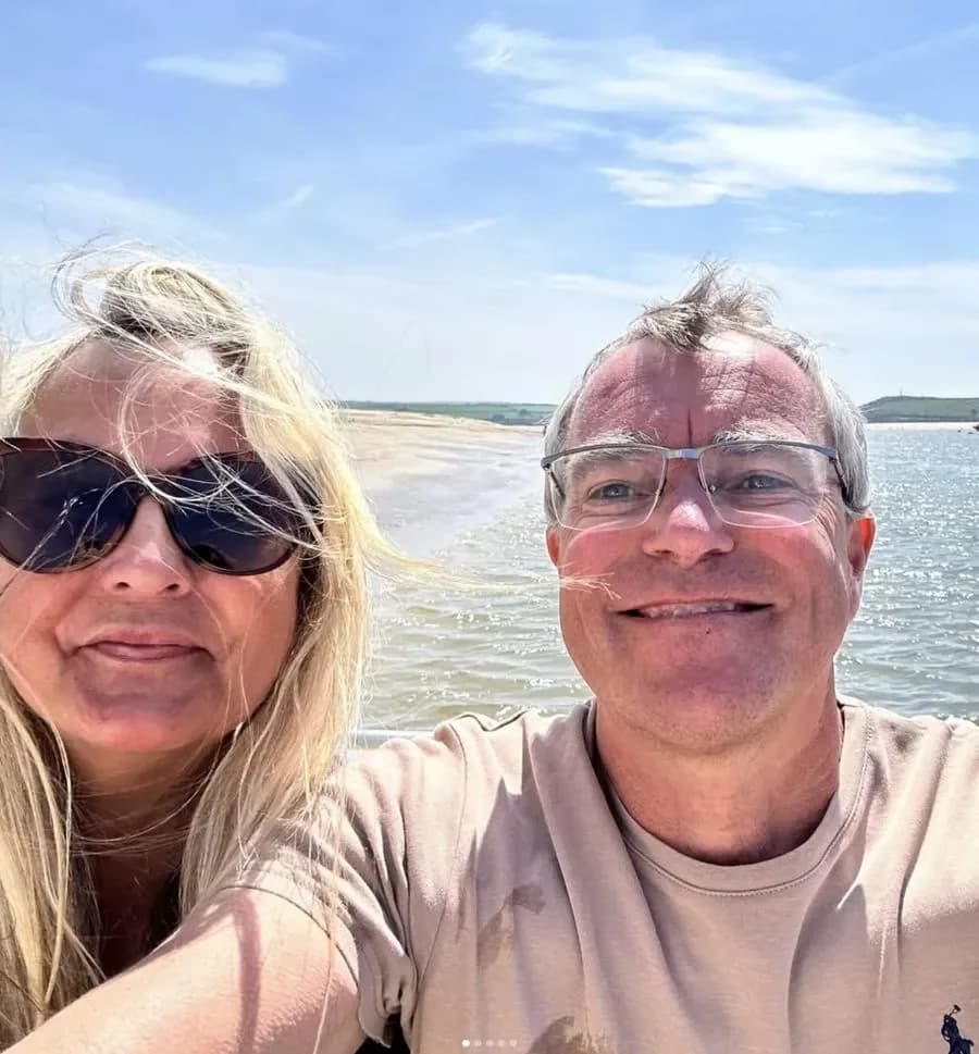 Andy and Pia on a windy beach